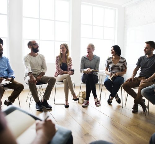 Diverse group of people in a seminar